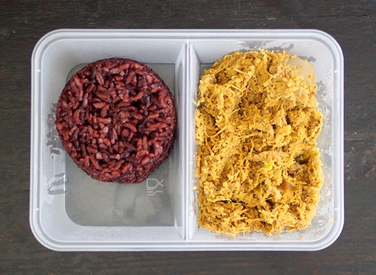 Your order is packed in a box with separate compartments for the black rice and duck brisket 'rendang'.