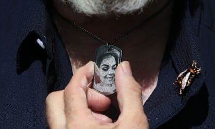Steve Goodman, grandfather of Olivia Campbell-Hardy, displays a pendant with the face of Olivia following the sentencing of the bomber’s brother Hashem Abedi