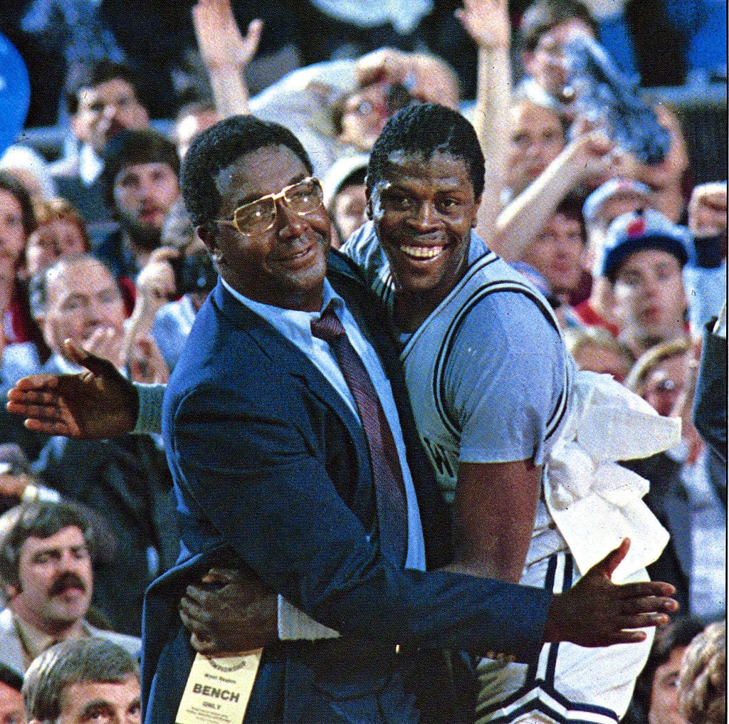 Patrick Ewing and John Thompson, head coach of the Georgetown University Hoyas, pose for a photo during a game at McDonough Arena in Washington, D.C.