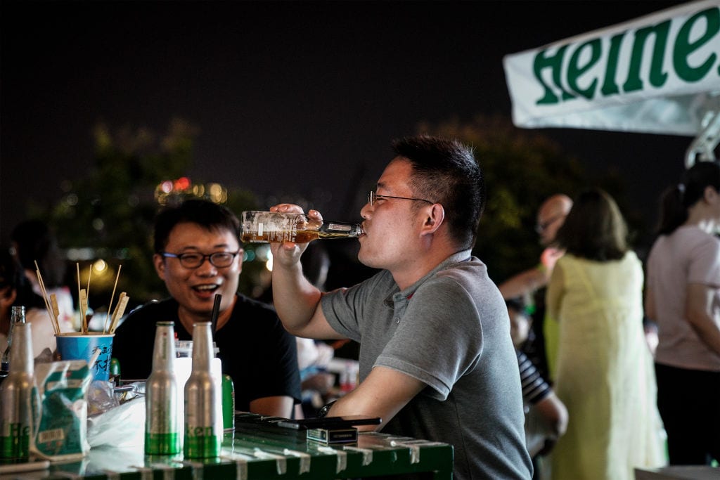 Residents drink during the Wuhan Beer Festival on August 21, 2020 in Wuhan, Hubei, China.