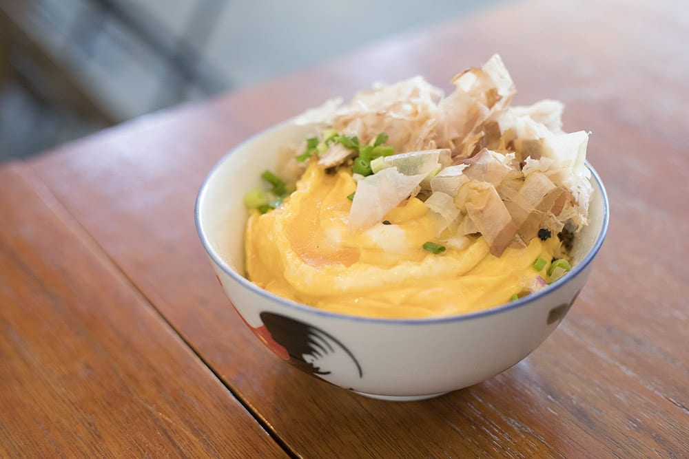 Ebony & Ivory’s signature rice bowl – filled to the brim with creamy scrambled eggs and umami-tinged bonito flakes.