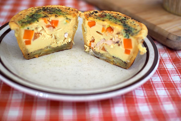 The quiche has a firmer egg custard with chicken, carrots and herbs that make it ideal for children's lunch boxes since there's no sauce