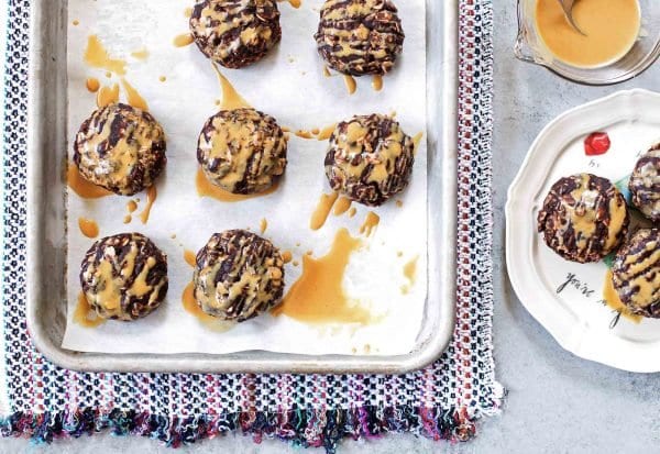 Chocolate peanut butter no bake cookies drizzled with peanut butter.
