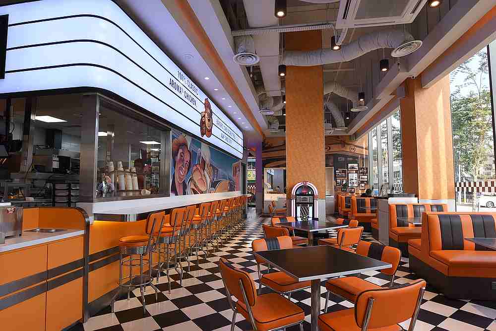 The A&W in Seventeen Mall has a vibrant retro outlook and even a working Jukebox for guests to tune in while enjoying their meals. — Picture by Arif Zikri