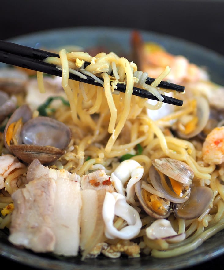 The yellow noodles and beehoon are fried with garlic and egg