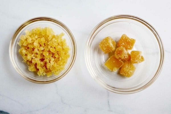 Candied ginger chopped in one bowl and cubed in another to make the Best Pumpkin Pie Bar Recipe.