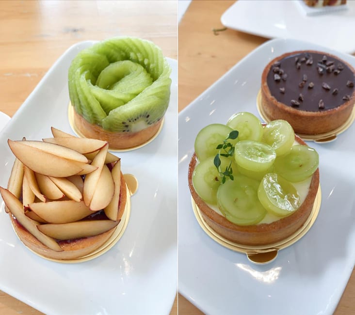 The plum tart is wonderfully balanced with the jam while the kiwi tart gives a refreshing taste (left). The grape tart has a light taste while chocolate tart is a decadent one with crunchy cocoa nibs on top (right).
