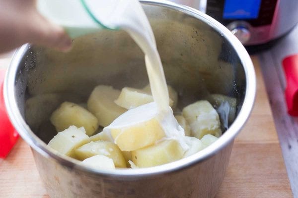 Add the cream for making instant pot mashed potatoes