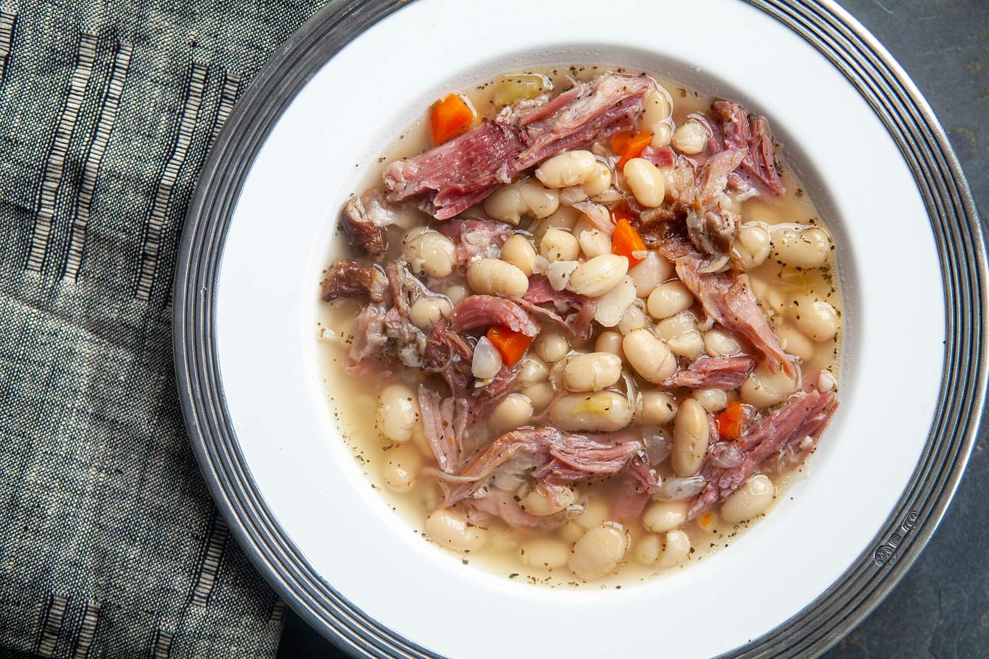 Ham and bean soup in a round bowl