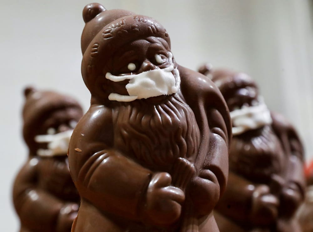 Chocolate Santas wearing protective face masks are seen in the workshop of the Hungarian confectioner Laszlo Rimoczi, during the coronavirus disease outbreak in Lajosmizse, Hungary, November 20, 2020. Picture taken November 20, 2020. — Reuters pic