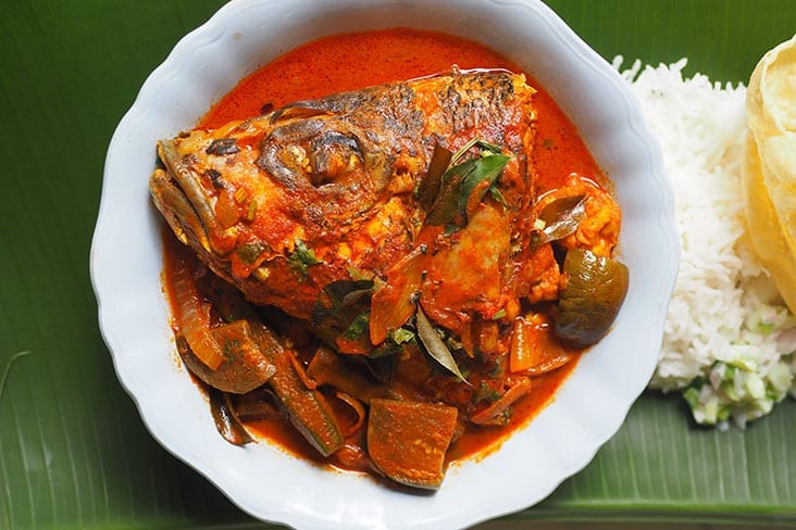 Indulge in this fish head curry served with jenahak fish, beancurd puffs, lady’s fingers, tomatoes and eggplants. — Pictures by Lee Khang Yi