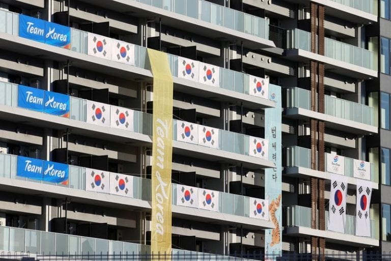 Other Sports: Olympics-South Korea team told to remove banners at Olympic village