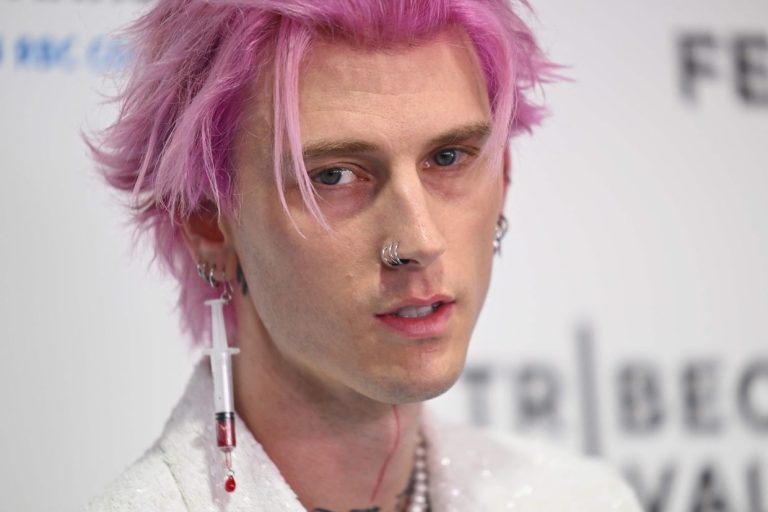 Machine Gun Kelly bloodies himself with smashed wine glass at after-party