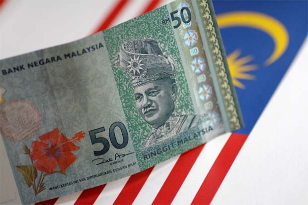 Ringgit opens flat ahead of OPR decision later this week